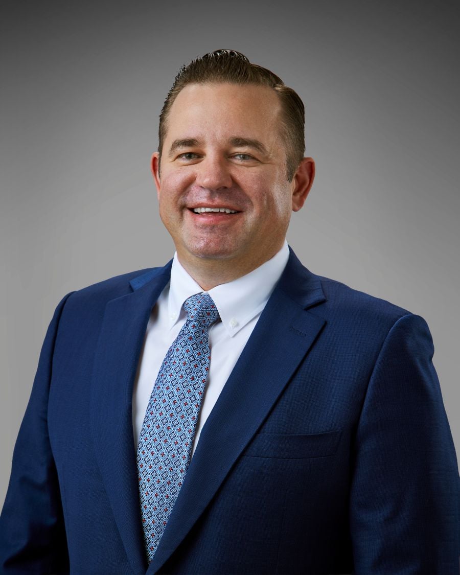 Headshot of Justin Dick, JD, MBA, CTFA 