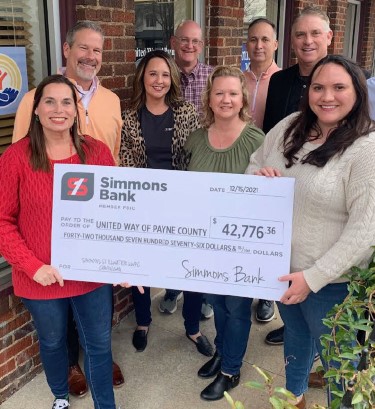 simmons associates presenting check to United Way of Payne county