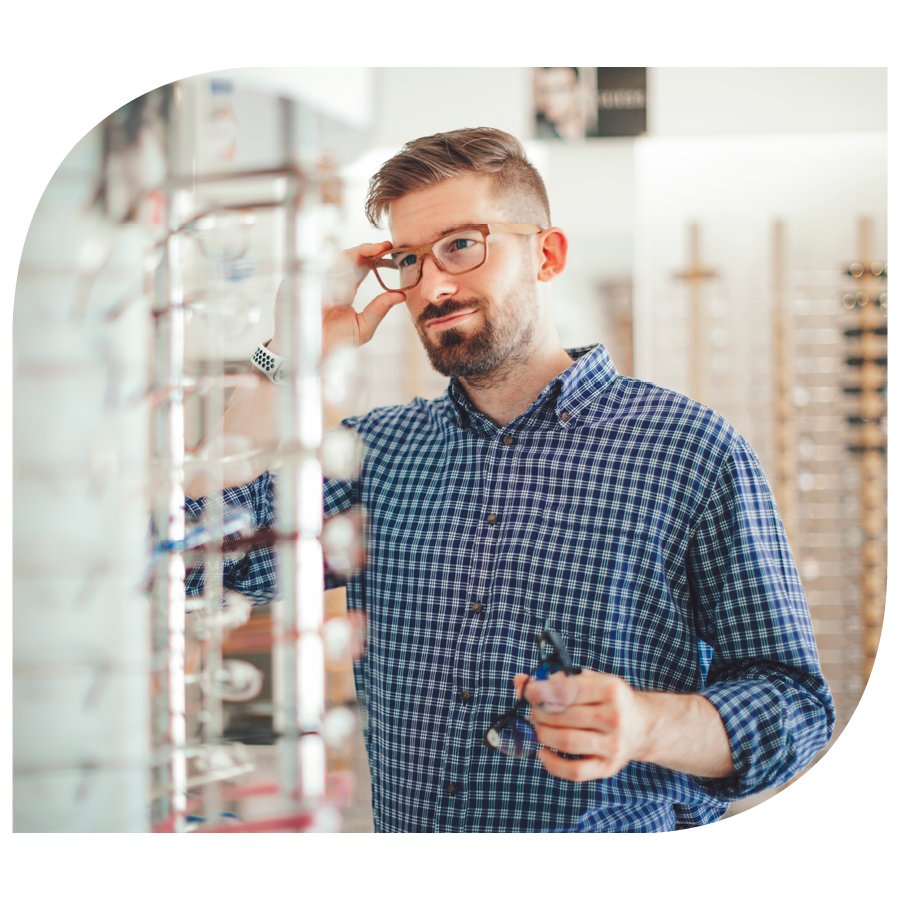 man shopping for new eyeglasses