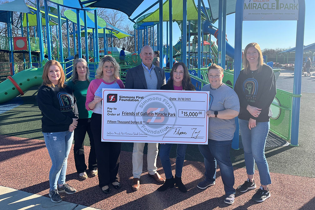 simmons associates present check to friends of Gallatin miracle park