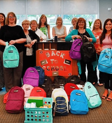 Associates fill back-to-school backpacks
