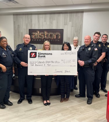 simmons associates presenting check to Collierville Citizens Police Association